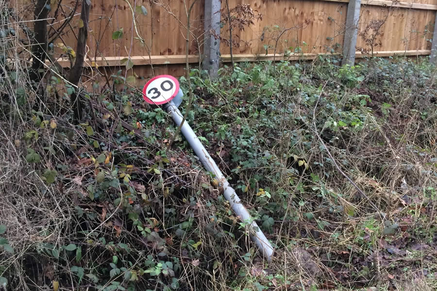 damaged 30mph sign